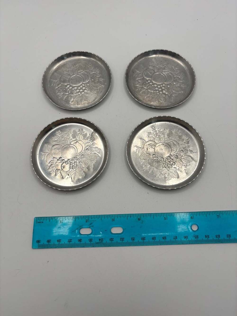 Set of 4 Vintage Embossed Aluminum Fruit Motif Coasters